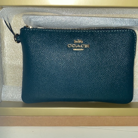 COACH LEATHER WRISTLET WITH TWO REMOVABLE CHARMS - Picture 2 of 4